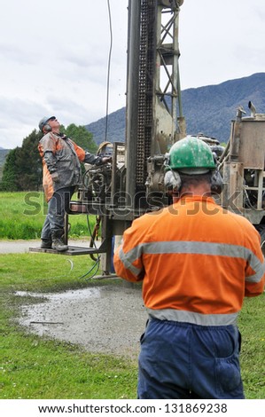 Man drilling a new water bore, Westland, New Zealand