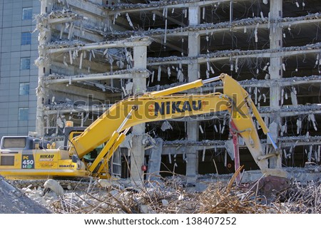 CHRISTCHURCH, NEW ZEALAND, NOVEMBER 16:  An excavator continues demolitions in earthquake ridden Christchurch, New Zealand, 16-11-2012.