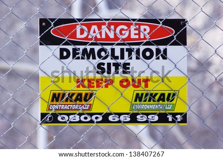 CHRISTCHURCH, NEW ZEALAND, NOVEMBER 16 - Signage warns people to keep out of demolition area in Christchurch, New Zealand on 16-11-2012 . 182 people died in the 6.4 earthquake the previous year.