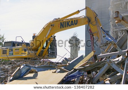 CHRISTCHURCH, NEW ZEALAND, NOVEMBER 16:  An excavator continues demolitions in earthquake ridden Christchurch, New Zealand on 16-11-2012. 182 people died in the 6.4 earthquake the previous year.