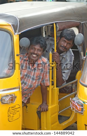 TIRUNELVELI, TAMIL NADU, INDIA, circa 2009: An unidentified auto driver looks for customers, circa 2009 in Tirunelveli, Tamil Nadu, India. The Indian economy depends on private enterprise.
