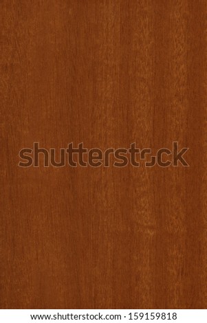background of wood grain from Mahogany, the straight-grained, reddish-brown timber of three tropical hardwood species of the genus Swietenia, part of the chinaberry family, Meliaceae