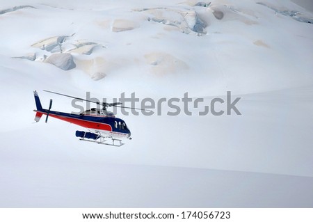 FRANZ JOSEF GLACIER, NEW ZEALAND: DECEMBER 24, 2009: helicopter flight approaching Franz Josef Glacier, Westland, New Zealand