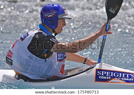 SOUTH ISLAND, NEW ZEALAND, FEBRUARY 12, 2011: Carl Schiller competes in the kayaking leg of the 2011 Coast to Coast triathlon, New Zealand