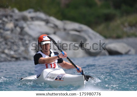 SOUTH ISLAND, NEW ZEALAND, FEBRUARY 12, 2011: James Block competes in the kayaking leg of the 2011 Coast to Coast triathlon, New Zealand
