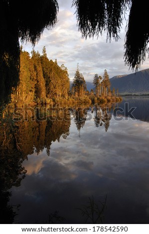 Late afternoon at Lake Haupiri, a small lake near the Southern Alps, West Coast, South Island, New Zealand.