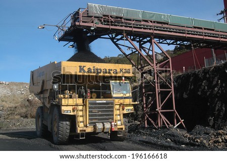 WESTPORT, NEW ZEALAND, CIRCA 2007: Truck loads up with 100 ton of coal at Stockton Coal Mine, West Coast, South Island, New Zealand