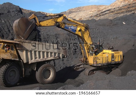 WESTPORT, NEW ZEALAND, CIRCA 2007: Digger loads up a truck with high grade coal at Stockton Coal Mine, West Coast, South Island, New Zealand