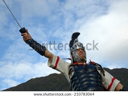 A Roman centurion musters his men for battle