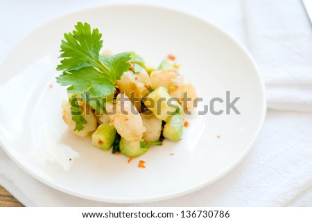 Macro of Shrimp and Avocado Salad on White Plate