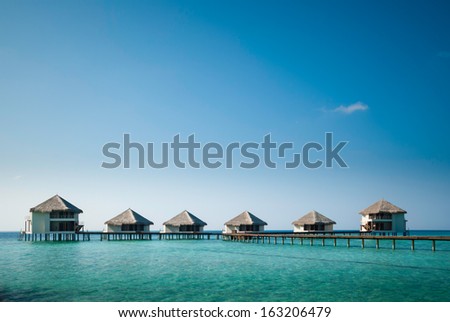 Watervilla area of a maldivian resort.