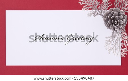 Silver pine cone with card and \'Season\'s Greeting\'