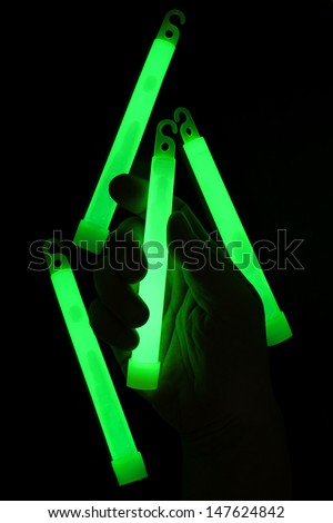 A hand holding glow stick