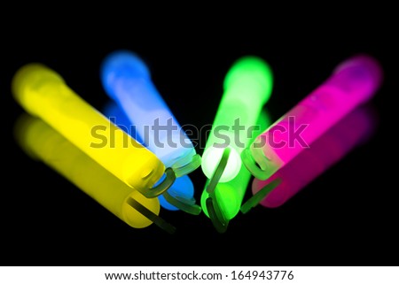 Multicolor glow sticks, with selective focus
