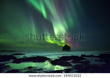 Northern Lights in Iceland, shot by the sea.