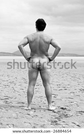 stock photo Naked man on beach