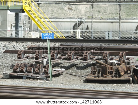 Guard rails at a railroad construction and repair depot.