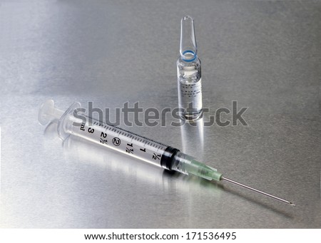 Filter needle, syringe and glass ampule.