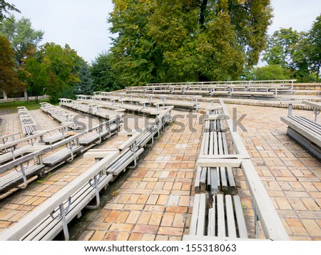 Empty benches in the open air theater