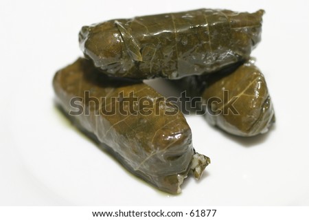 Dolmades (Vine leafs\
\
filled with rice and spices)- Greek dish, macro, shallow DOF.