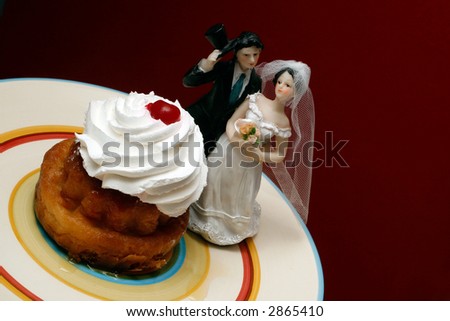 SAVARINA (Romanian dessert - cake and whipped cream) - with a bride and a groom dolls.