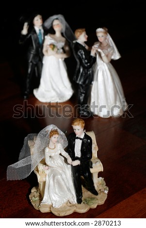 Three couples - bride and groom dolls