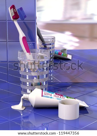 Toothbrush, glass, toothpaste and mirror on  blue tile