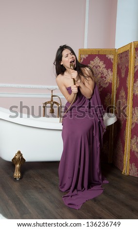 woman sings in the shower