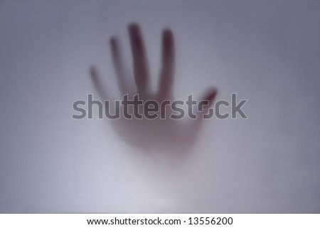 outline of a hand in mist