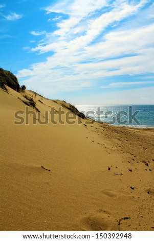 Issos beach with gold sand dunes in Corfu island, Greece