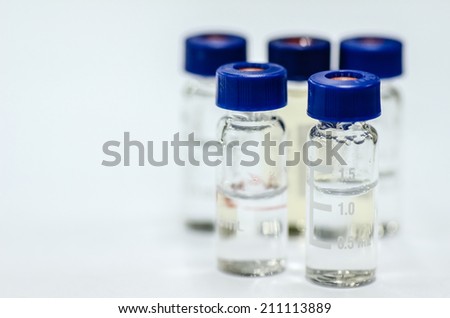 Analytical chemistry sample vial (blue screw cap)
