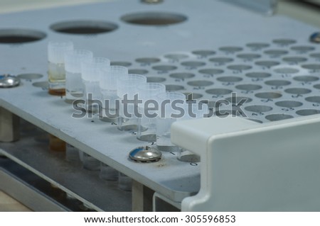 Shell type sample vial in aluminum rack ready to analysis