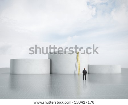 man looking at empty podium with golden ladder