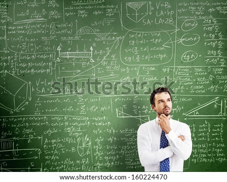 Thinking Man Against Desk With Formulas