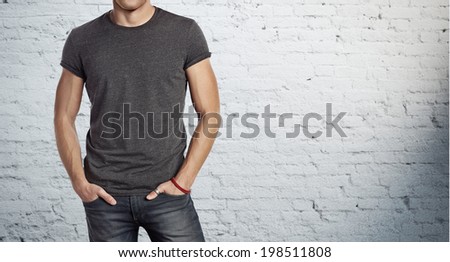 man wearing dark grey t-shirt