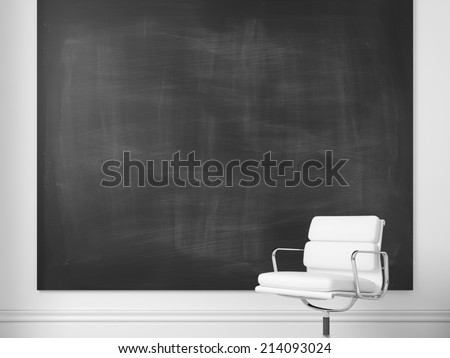 White office chair and blank chalkboard on a wall