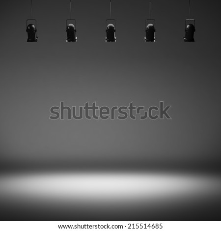 Empty photo studio background with lamps and spotlights