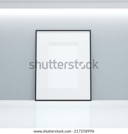 Interior with empty picture frame on a wall