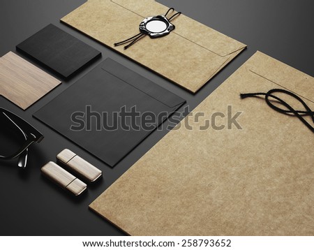 Set of black craft identity elements on black paper