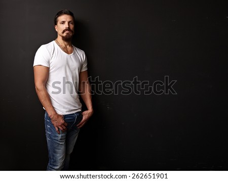 Bearded handsome guy in white t-shirt