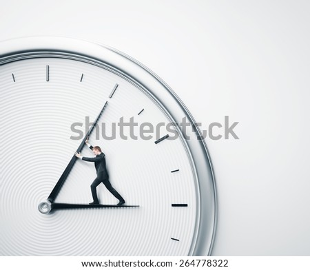 Businessman trying to stop time