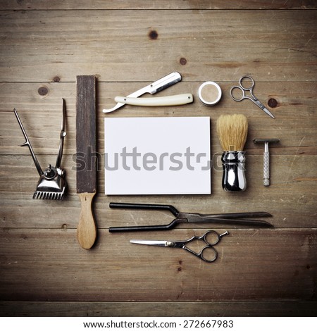 Set of vintage tools of barber shop with white poster