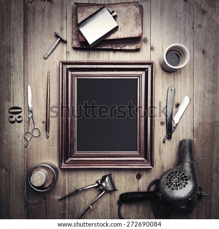 Vintage tools of a barber with picture frame Vintage tools of a barber with picture frame