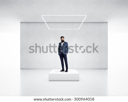 White space with podium and man wearing suit