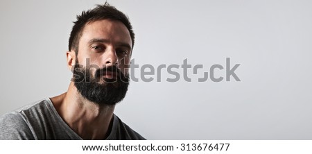 Close-up portrait of a attractive bearded man
