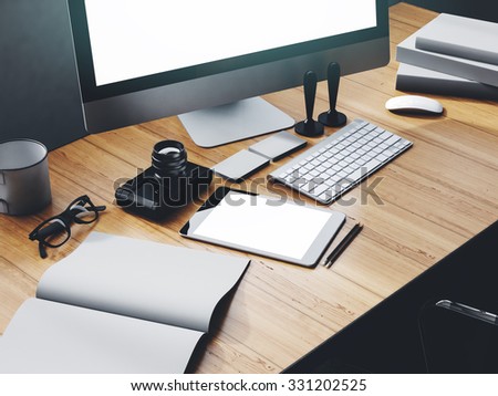 Photo of modern workspace with desktop screen, tablet, camera, keyboard and open gray book.   3D rendering