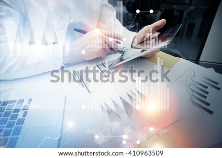 Bank trade manager working process.Concept photo trader work market report modern tablet.Using electronic device.Graphic icons,stock exchange reports screen interfaces.Business startup.Film effect