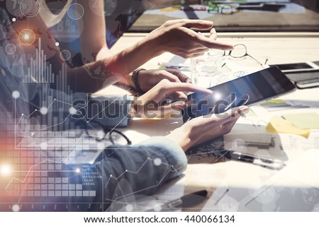 Woman Touching Screen Electronic Tablet Hand.Project Managers Researching Process.Business Team Working New Startup modern Office.International Digital Charts Interfaces.Analyze market stock.Blurred