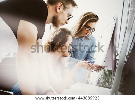 Coworkers Team Working Office Studio Startup.Businessman Using Modern Tablet,Desktop Monitor Wood Table.Bank Managers Market Researching Process.Virtual Digital Diagram Interface Screen.Blurred.