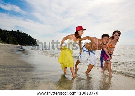 group of friends have fun holiday by the beautiful beach